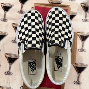 Vans Black and White Checkered Slip-Ons